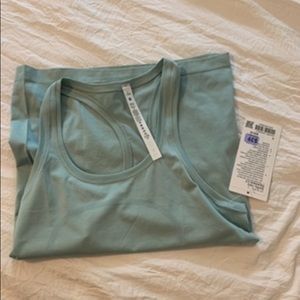 Blue lululemon swiftly tech razorback tank size 6